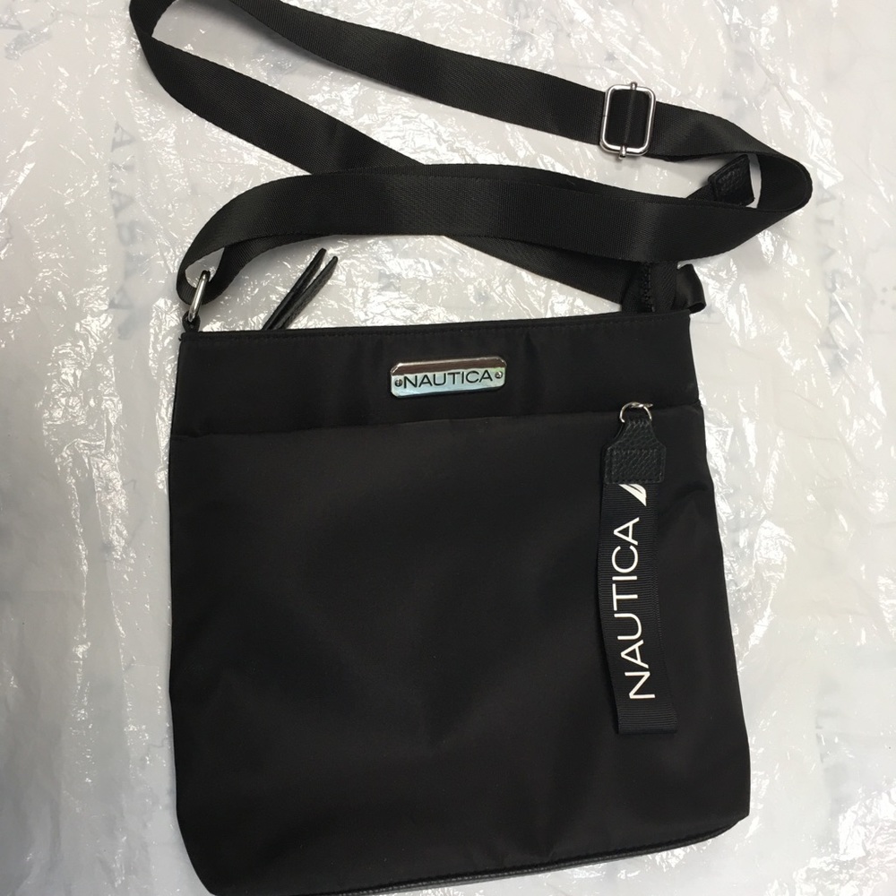 NAUTICA crossbody bag.Nylon. Excel cond. Bold metal emblem & 4” brand zip pull.